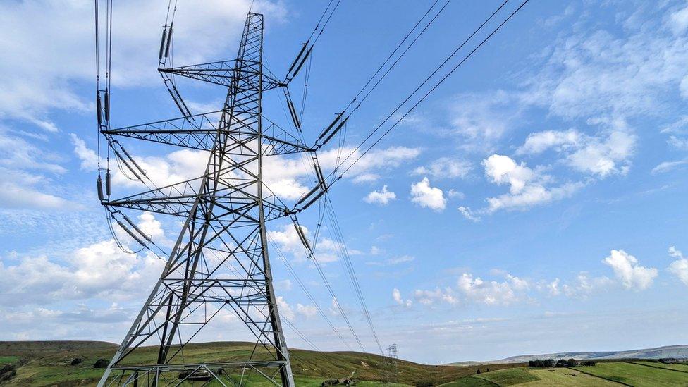 Pylon with moors behind