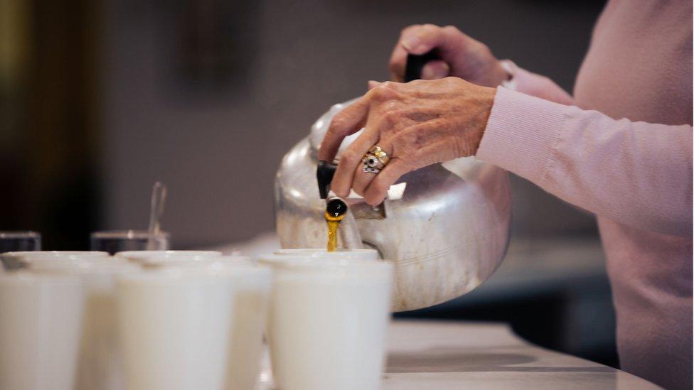 Woman pouring tea