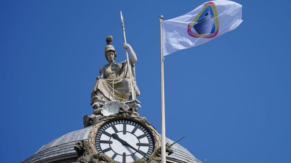 The Windrush flag flies over Liverpool Town Hall