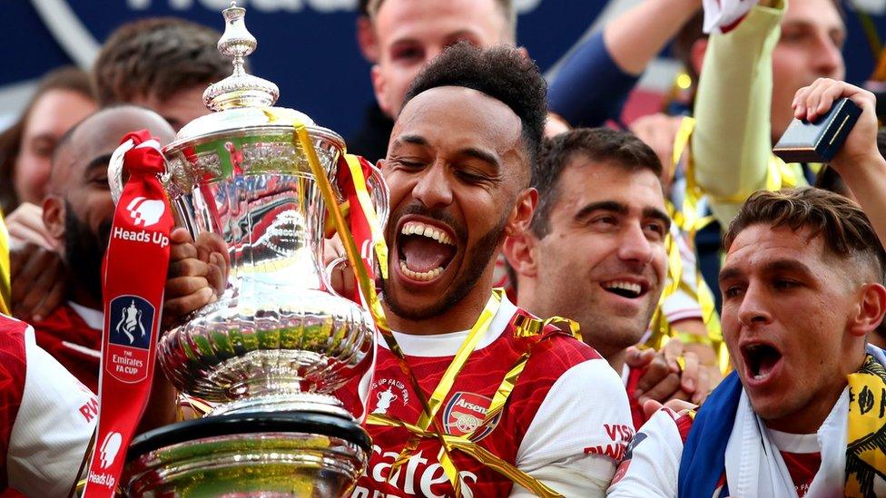 Pierre-Emerick Aubameyang of Arsenal celebrates with the trophy during the FA Cup Final match between Arsenal and Chelsea at Wembley Stadium