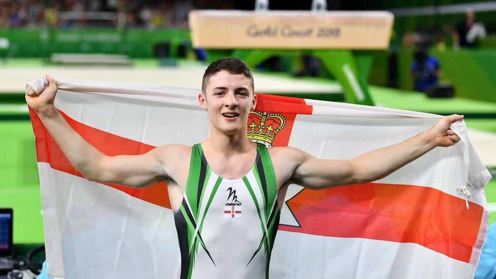 Rhys McClenaghan with the Northern Ireland flag