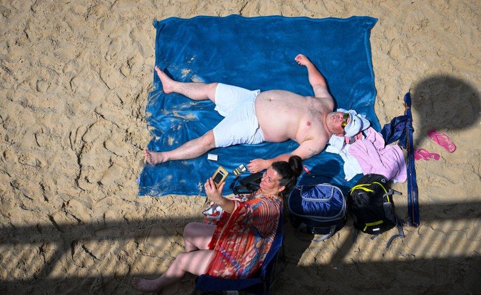 Sunbather at Bournemouth Beach