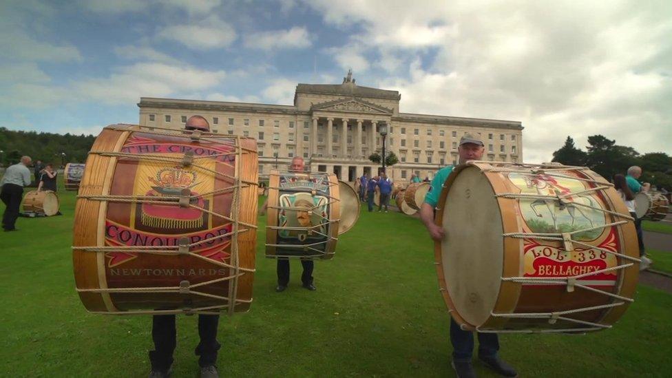 Men playing Lambeg drums outside Stormont