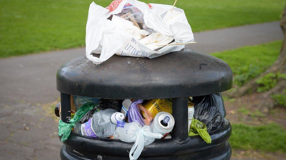 A public rubbish bin.