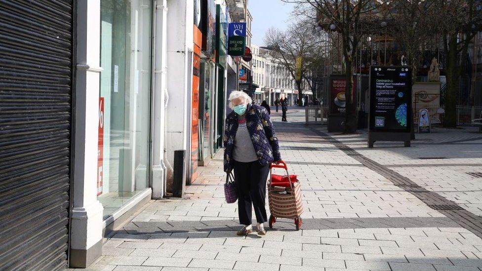 Elderly woman wearing mask