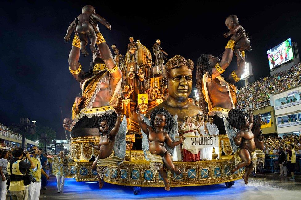 Anielle Silva (2-R), sister of murdered council woman Marielle Franco, takes part in the Vila Isabel samba school parade during the second night of Rio"s Carnival parade at the Sambadrome in Rio de Janeiro, Brazil on March 4, 2019