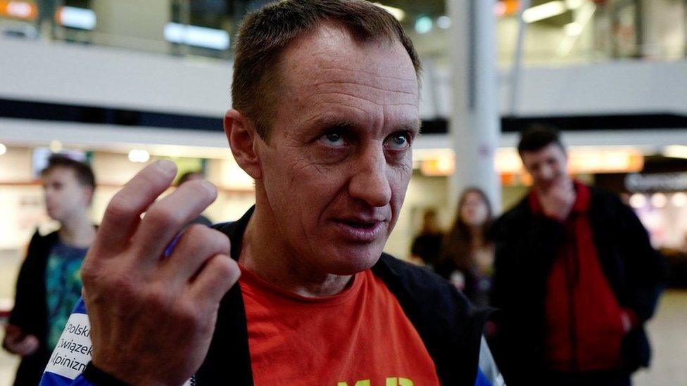 Denis Urubko speaks before the departure of the Polish national team for the expedition to scale K2 in the winter, at an airport in Warsaw