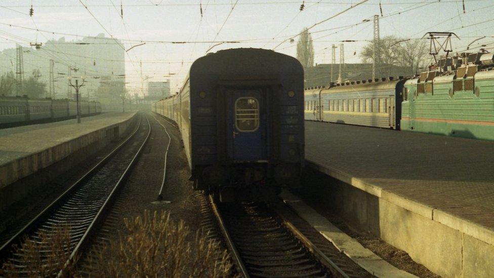 Izyum to Liverpool train journey showing train at station