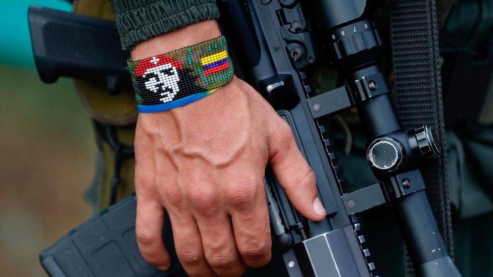 View of the handband of a FARC dissident guerrilla holding a rifle, in Casa Roja, Colombia, 16 April 2023 (issued 17 April 2023)