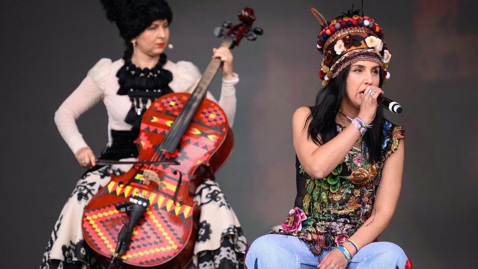 Jamala (R) joins Ukrainian group Dakhabrakha on the Pyramid Stage during day five of Glastonbury Festival at Worthy Farm, Pilton on June 26, 2022