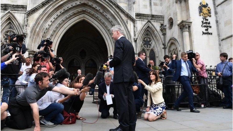 Press and media surround a spokesman for Charlie Gard's family