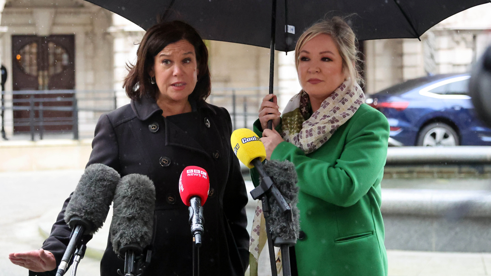 Mary Lou McDonald, left, and Michelle O'Neill outside the talks in Belfast