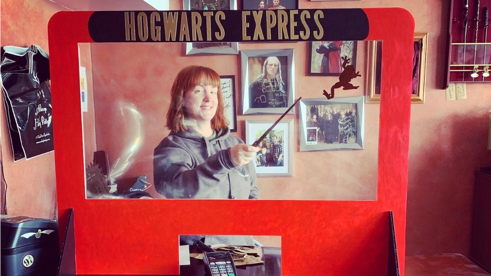 Debbie Corkish with a wand at the Wizarding Boutique in Llandudno, Conwy