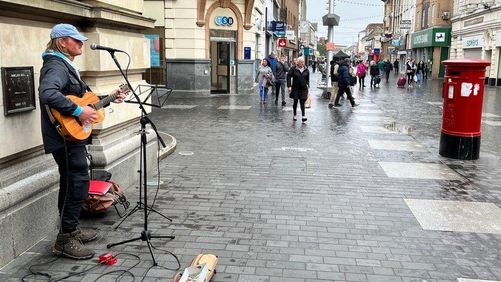 Rob Funnell busks in Grimsby town centre