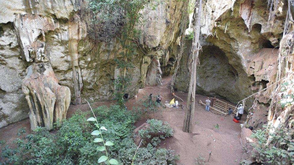 General view of the cave site of Panga ya Saidi. Note trench excavation where burial was unearthe (c) Mohammad Javad Shoaee