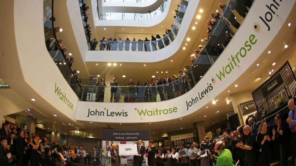 John Lewis and Waitrose staff clapping