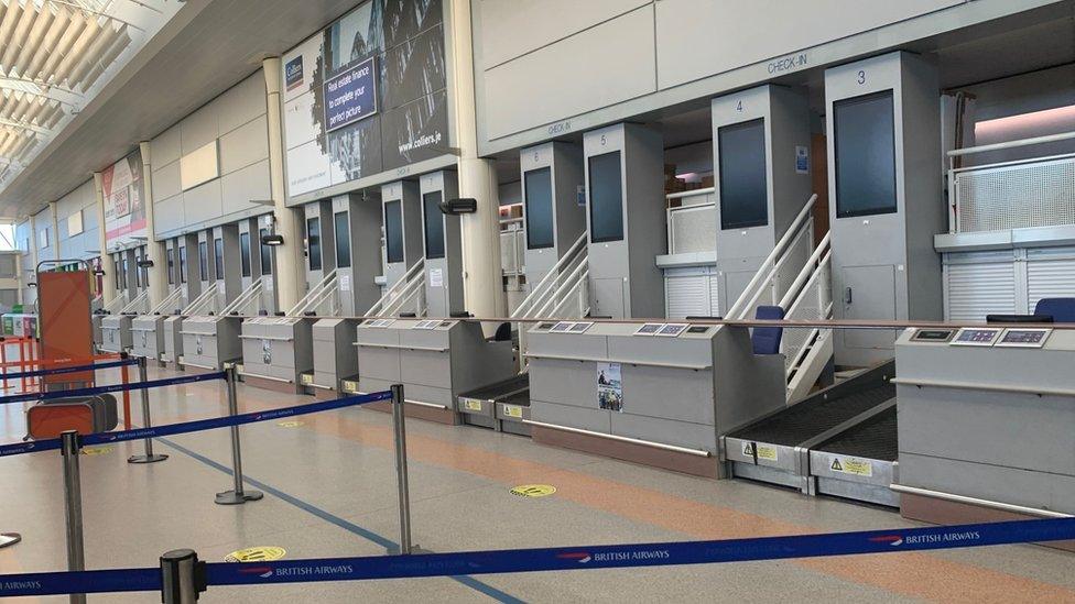 Empty jersey airport check-in desks