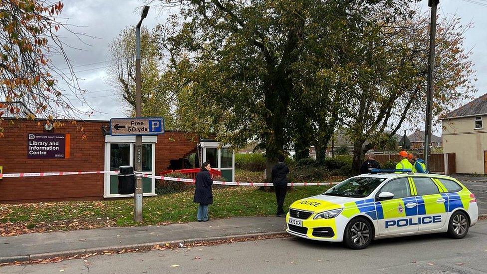 Car embedded in Sandiacre library