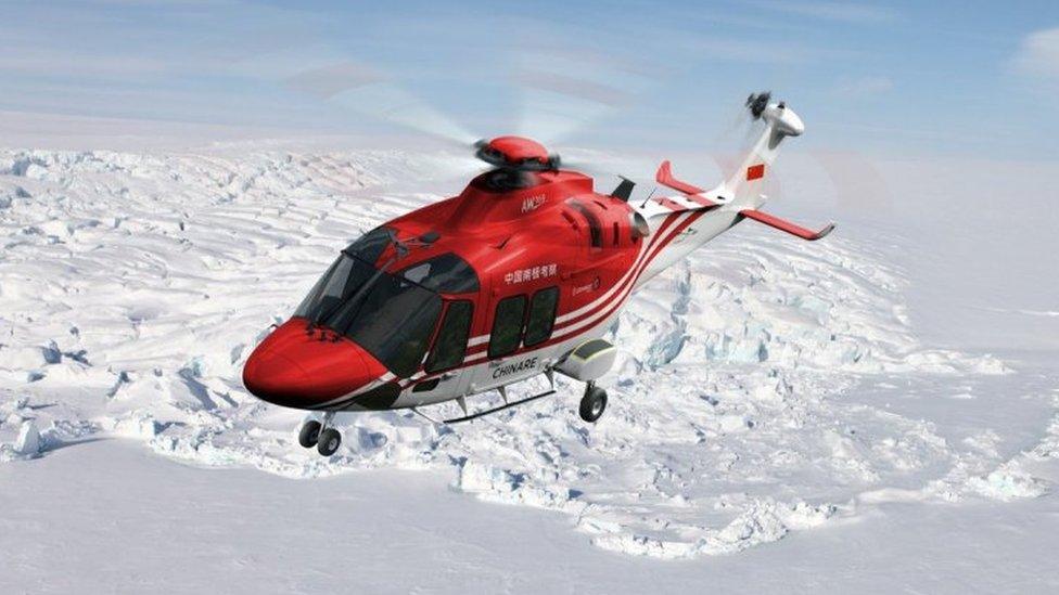 A Chinese helicopter assists in the evacuation of an Australian expeditioner from Antarctica