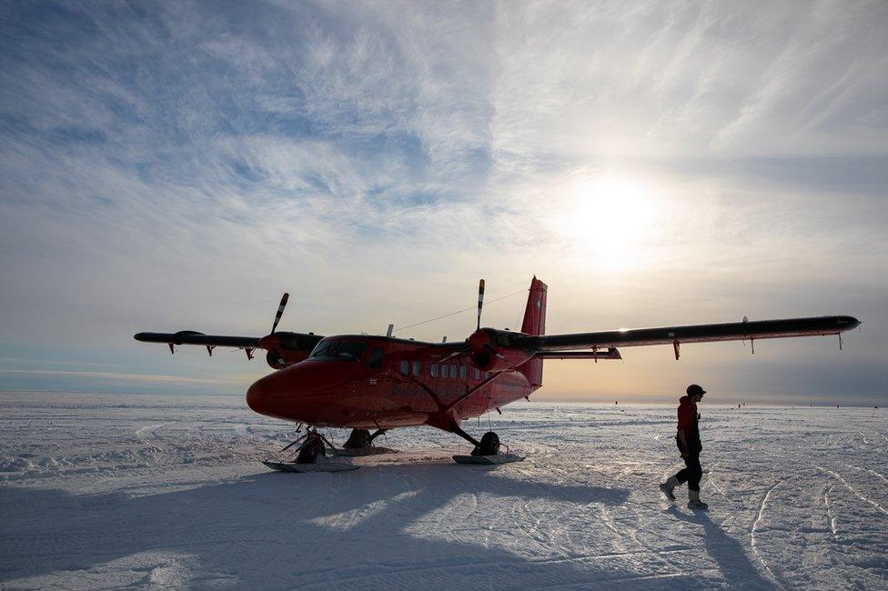 Man and plane on skis