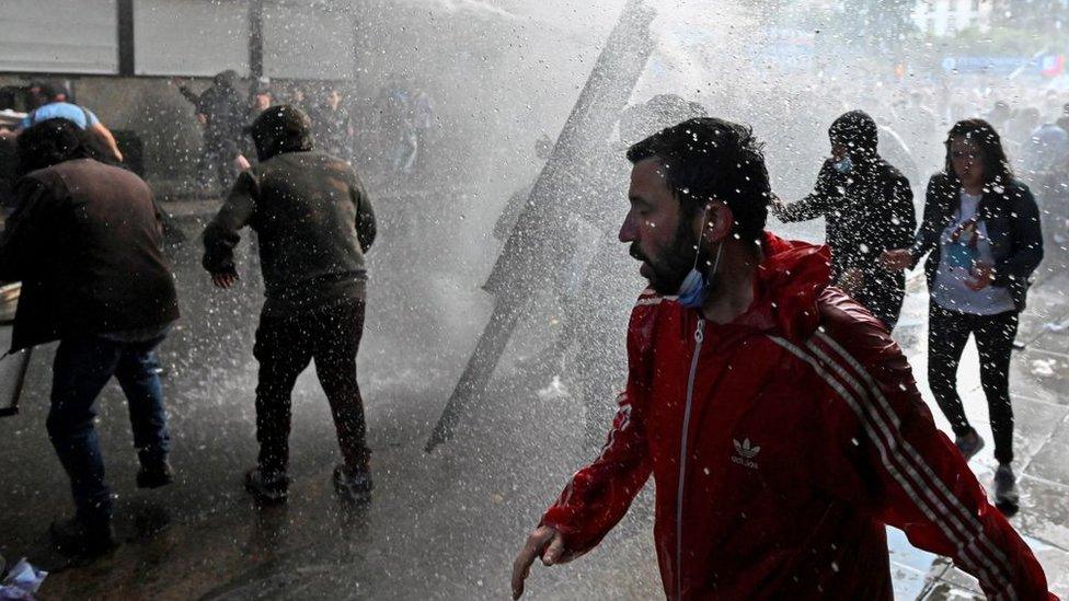 Demonstrators outside the home of the vice president in Buenos Aires on Saturday