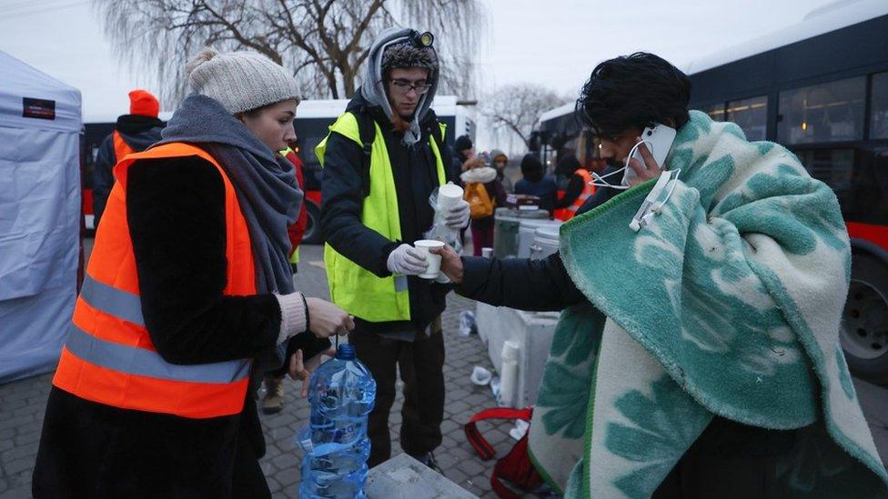 Refugees arriving at the Polish border of Medyka