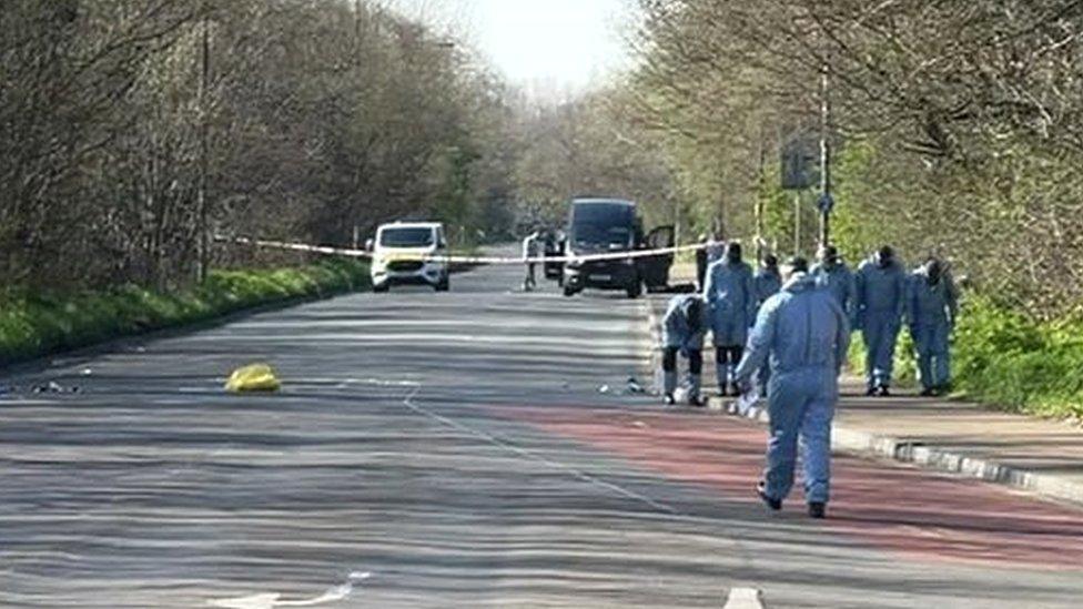 Forensics officers in Croydon Road in Mitcham, near the junction with Beddington Lane.