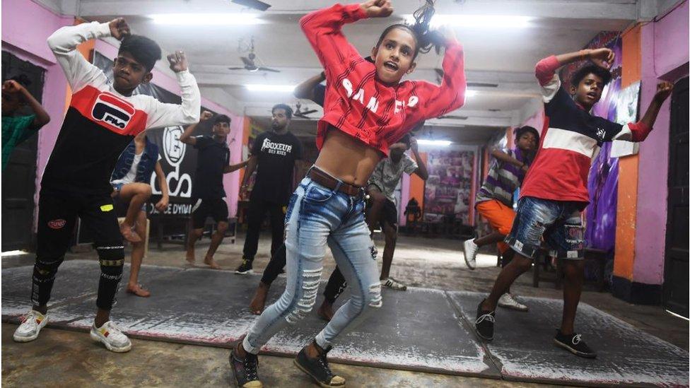 Gymnasts in India perform a TikTok dance in 2019