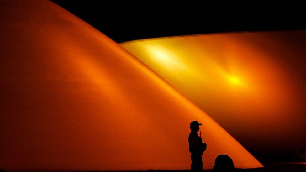 Security personnel are on guard outside the Brazilian National Congress