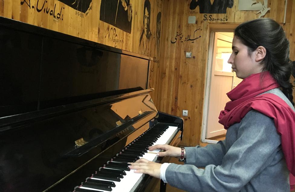 Negin playing the piano