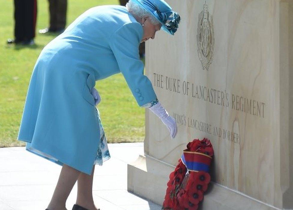 The Queen lays a wreath at the "Lion of England" statue