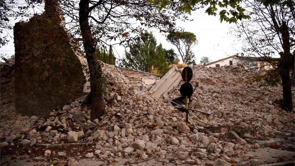 A collapsed wall in the centre of Norcia, central Italy, after the earthquake on 30 October 2016