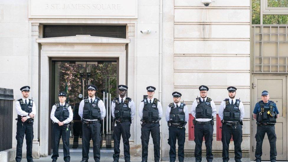 Police officers watch a memorial service for PC Yvonne Fletcher on the 38th anniversary of her death