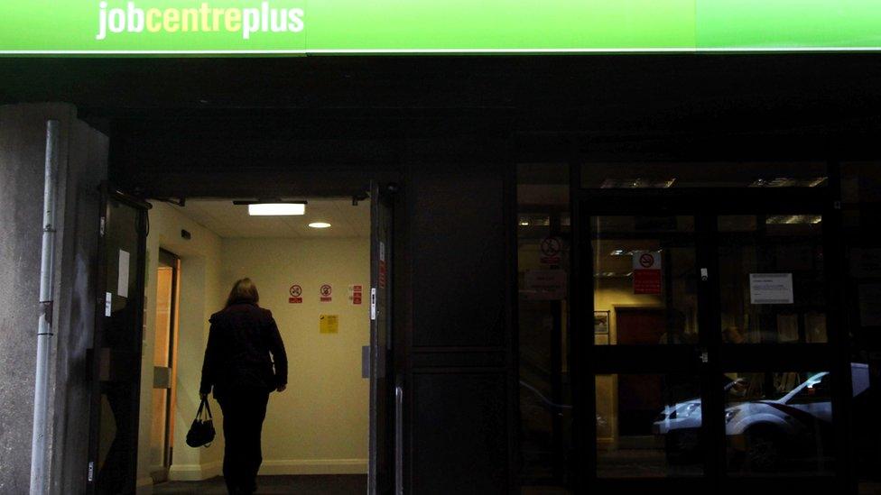 Woman walking into job centre