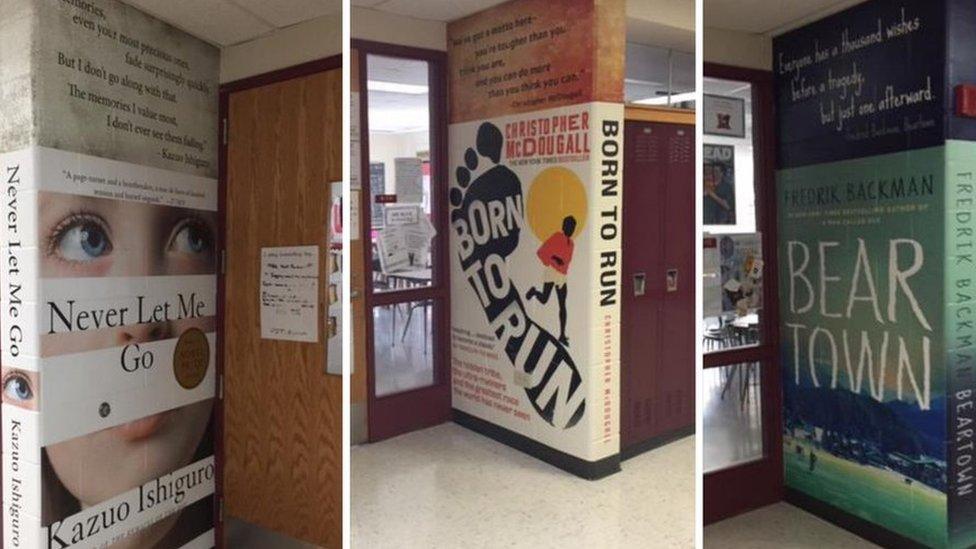 Photograph showing two murals in the corridor of Mundelein High School