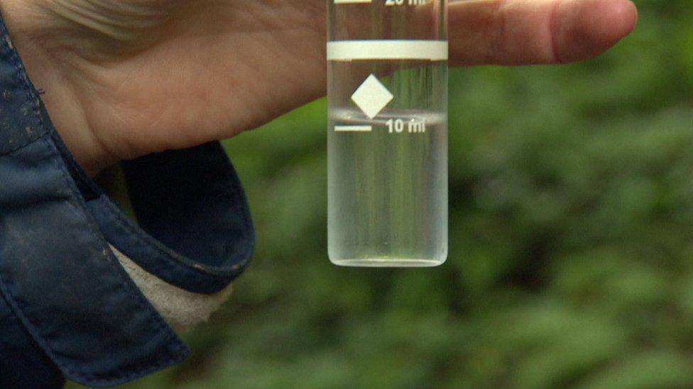 Water from stream held in a container