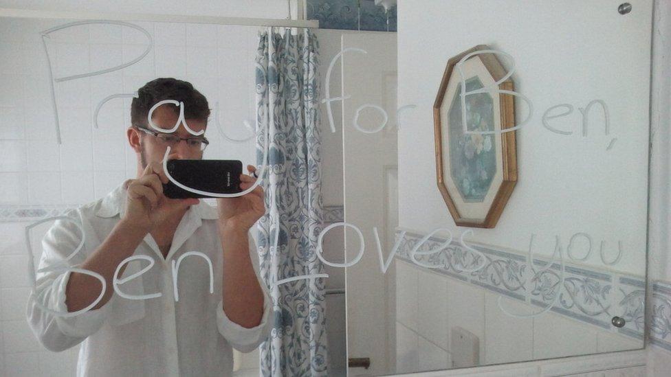 Photo of Ben Field with message written on mirror