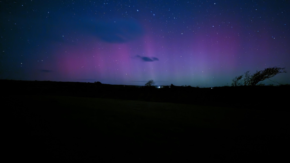 Hints of the aurora with mainly purple colours in the sky and hint of green on the horizon