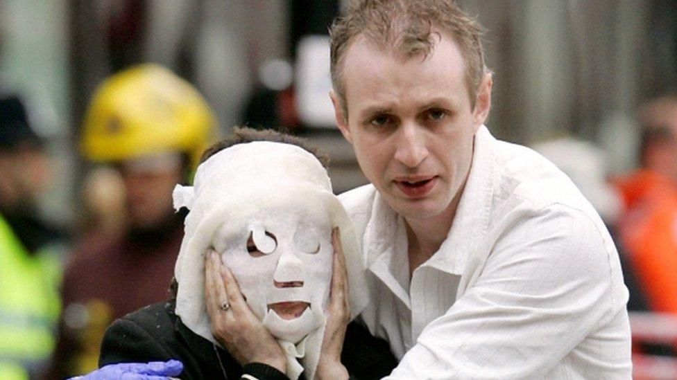 Paul Dadge and woman in mask