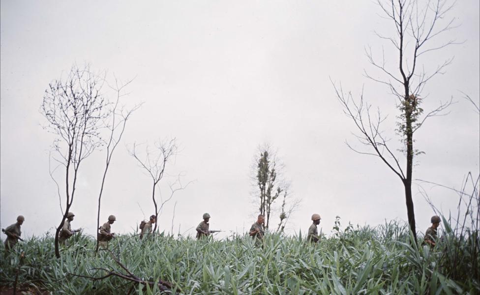 Squad of men on a patrol in Vietnam in 1969