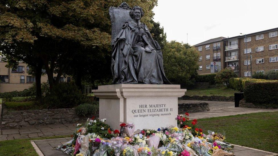 Floral tributes left at a statue of Her Majesty in Gravesend