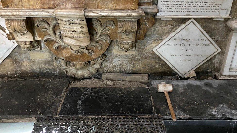 The final stone to be installed in the restoration of Bath Abbey's historic floor