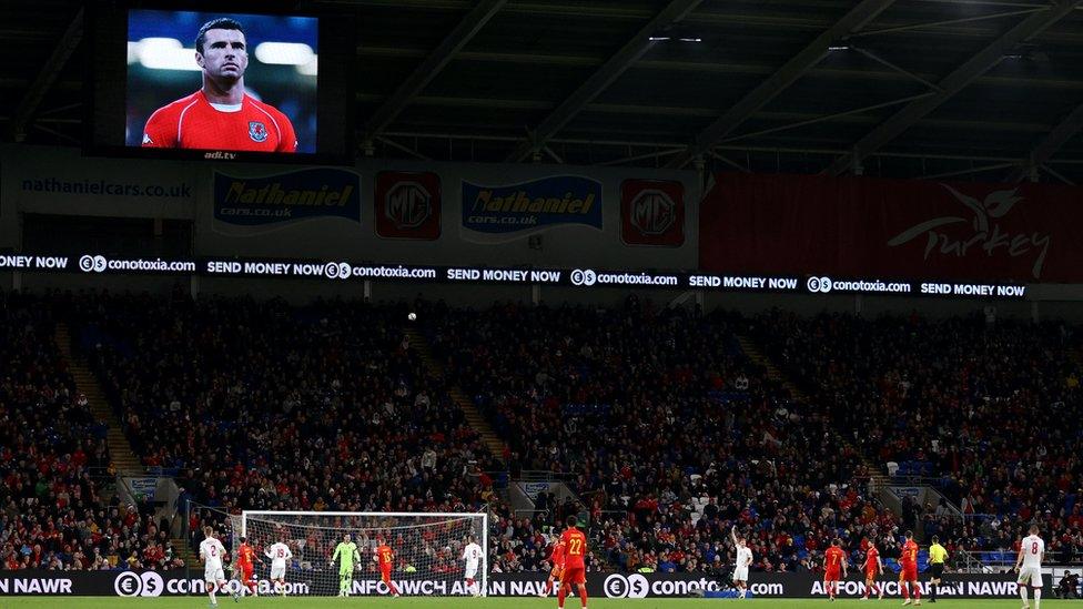 Image of Gary Speed displayed at a 2022 World Cup qualifier for Wales