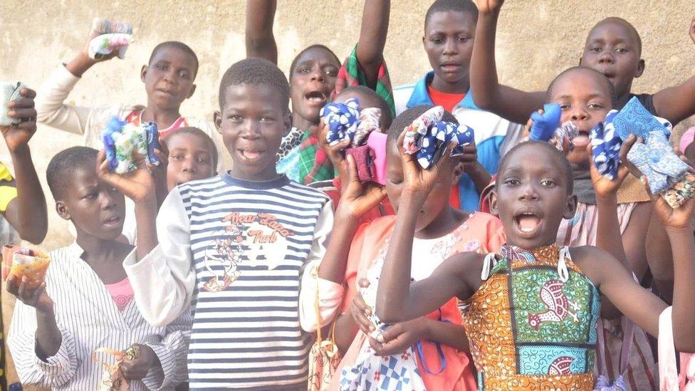 Children holding the Pacha Pads