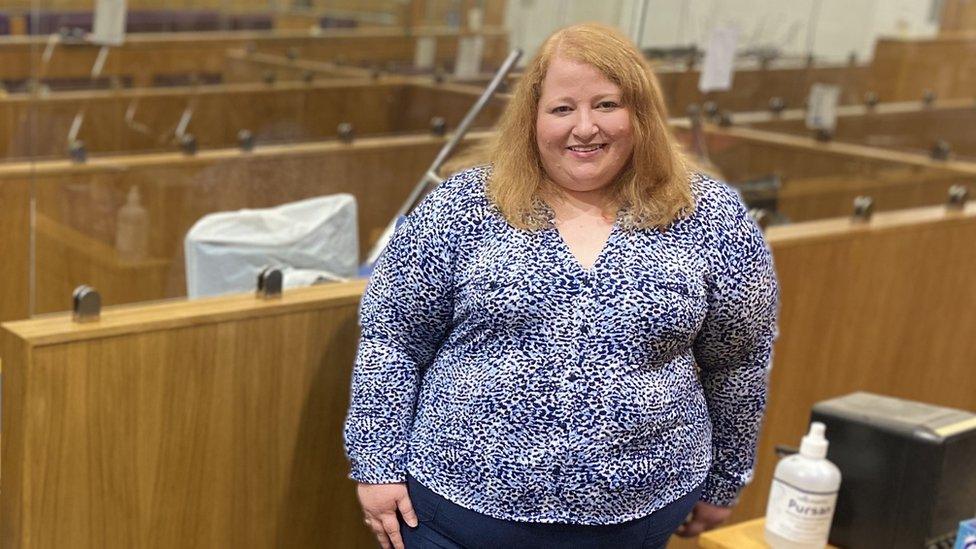 The Justice Minister Naomi Long in a court room