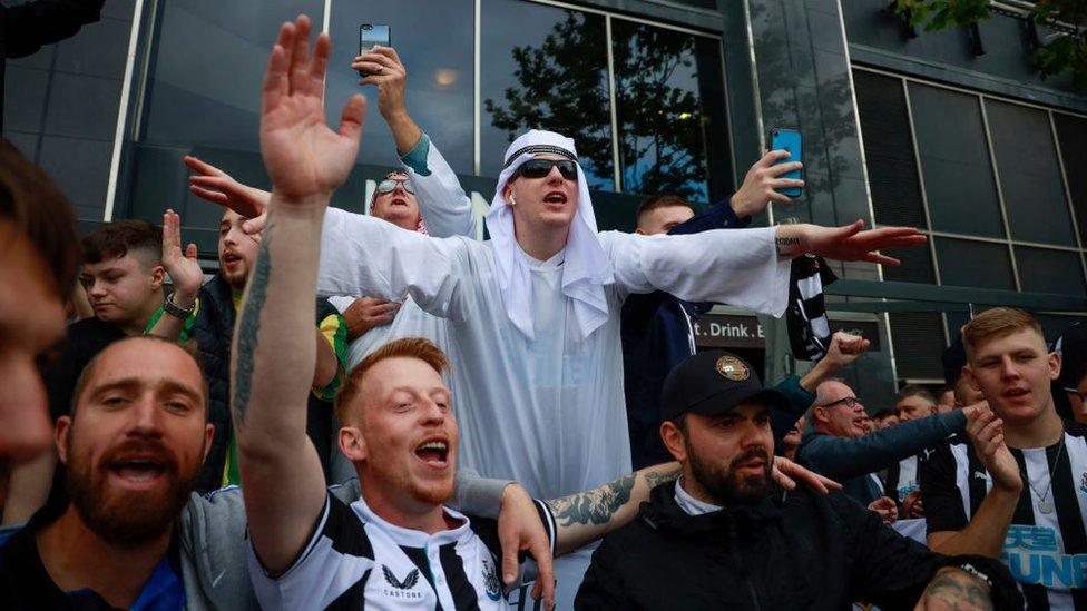 Fans outside St James' Park