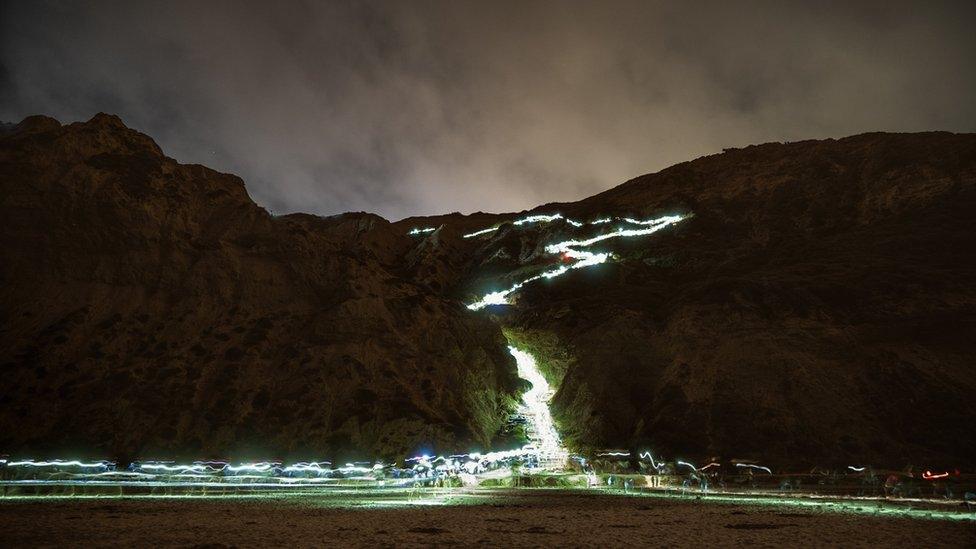 Bioluminescent algae weren't the only visitors creating a buzz in San Diego in the past two nights. Jack Fusco turned his camera on the throngs of algae spotters