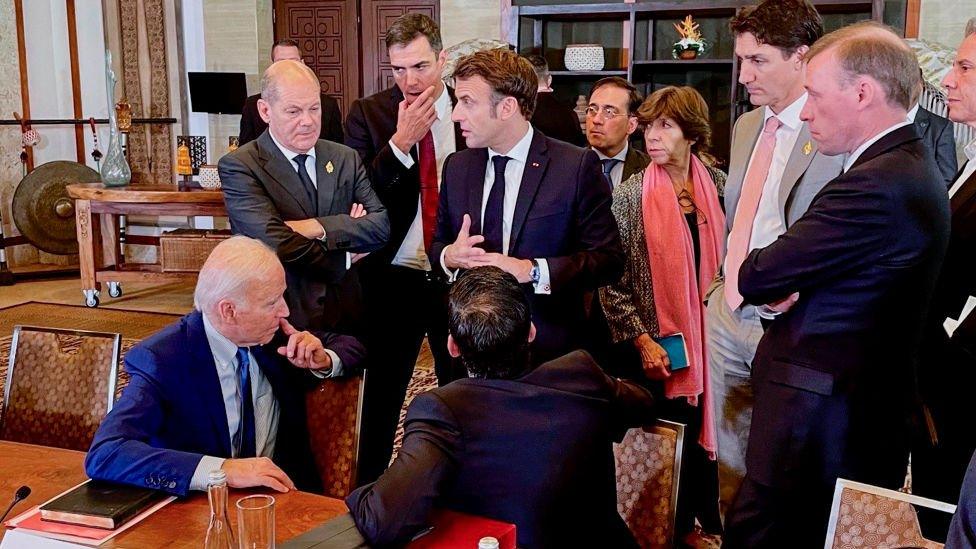 (L-R) US-President Joe Biden, German Chancellor Olaf Scholz, Spanish Prime Minister Pedro Sanchez, French President Emmanuel Macron, British Prime Minister Rishi Sunak, Spanish Foreign Minister José Manuel Albares Bueno, French Foreign Minister Catherine Colonna, Canadian Prime Minister Justin Trudeau and US Foreign Minister Antony Blinken (R) talk about the missile strike in Poland as the G20 meetings take place on November 16, 2022 in Nusa Dua, Indonesia.