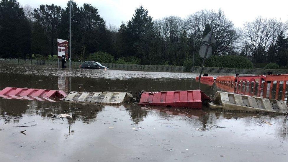 A car park in Pontypridd is submerged with flood water