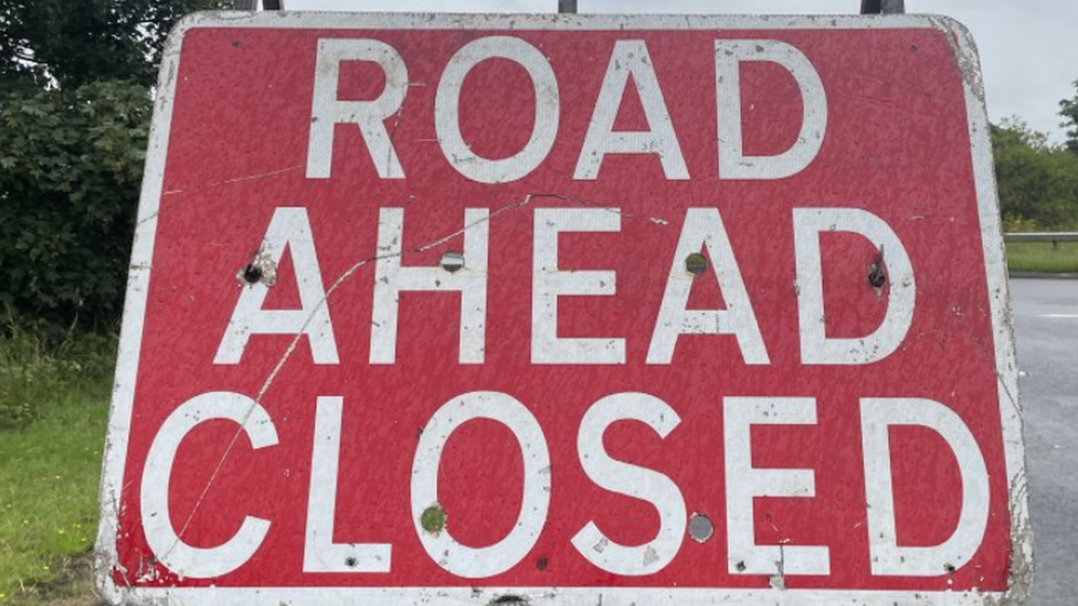 Road closed sign